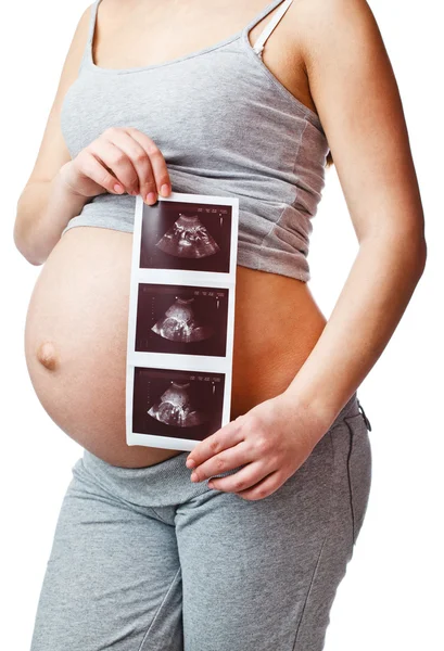 Kobieta w ciąży z USG obraz — Zdjęcie stockowe