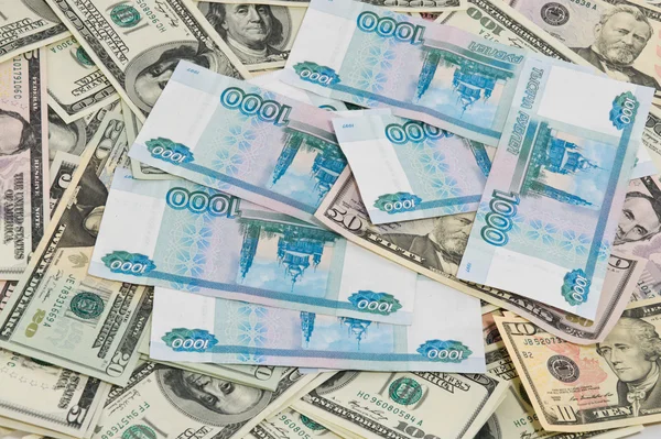 Arka plandan dolar ve Rus ruble — Stok fotoğraf
