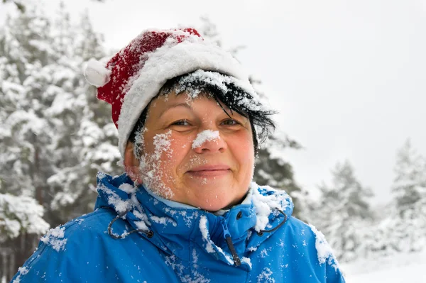 Woman sprinkled by a snow — Stock Photo, Image