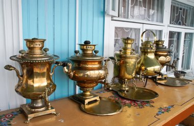 Samovar in the museum of samovars in Gorodets clipart