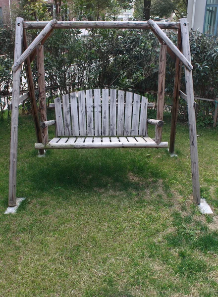 Swing chair in garden — Stock Photo, Image