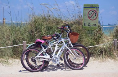 Bikes Parked at a Beach Access Point clipart