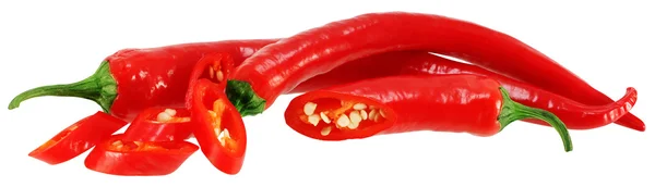 Červené chilli papričky na bílém pozadí. — Stock fotografie