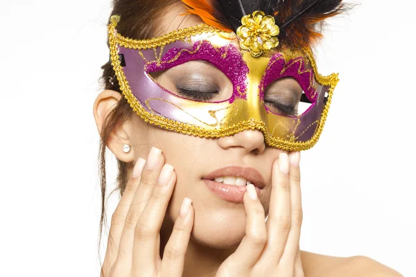Young beautiful woman in carnival mask on white isolated background — Stock Photo, Image