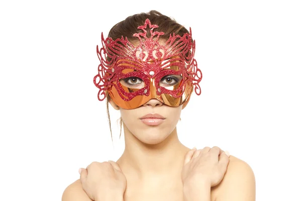 Sexy young woman in red venetian mask on white isolated background — Stock Photo, Image