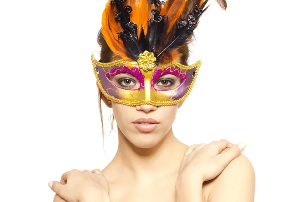 Young beautiful woman in carnival mask on white isolated background — Stock Photo, Image
