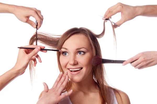 Make-up, knippen, vele handen — Stockfoto