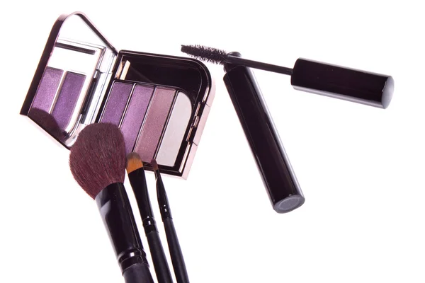 Un conjunto de maquillaje, sombra de ojos cepillo —  Fotos de Stock