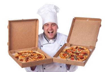 Male chef holding open two boxes of pizza clipart