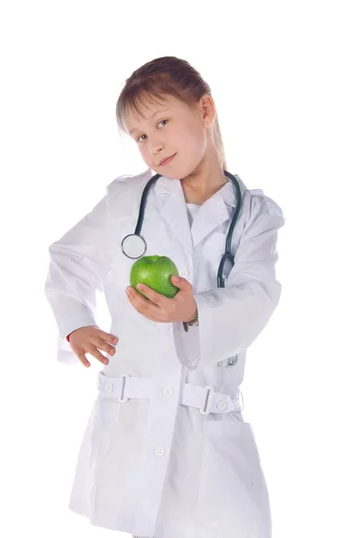 Meisje, een arts, de kind, apple — Stockfoto