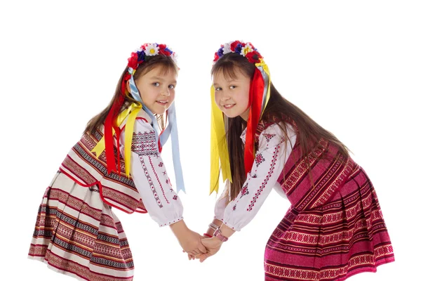 Ребенок, две девушки в ярком платье . — стоковое фото