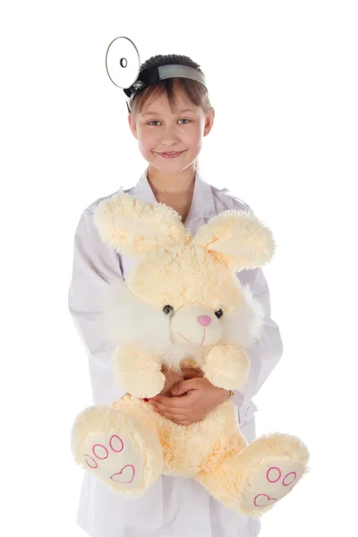 Дівчинка, лікар, дитина, іграшка для кролика Стокове Фото