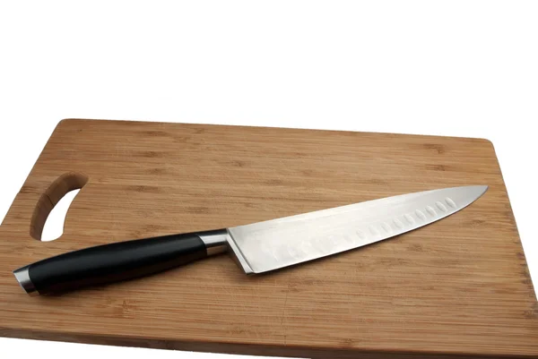 Messer für Fleisch und Schneidebrett Stockbild