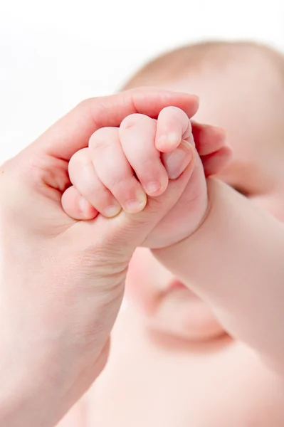 Mother massaging her baby — Stock Photo, Image