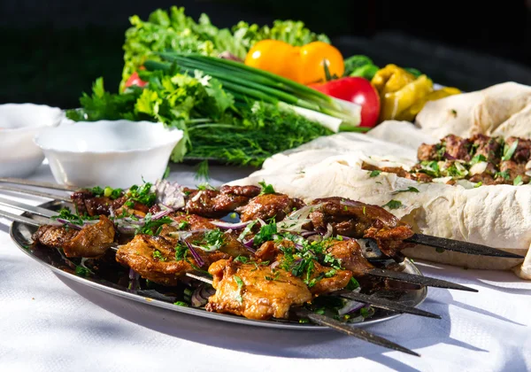 Shashlik with lavash and vegetables — Stock Photo, Image