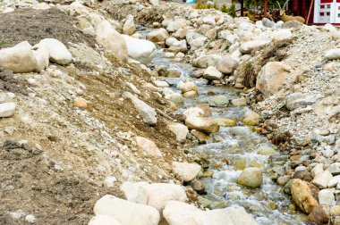 Ground with stones and water clipart