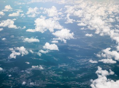 Ground and white fluffy clouds clipart