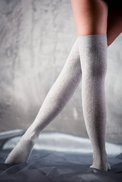 Beautiful woman legs in cotton stockings — Stock Photo, Image