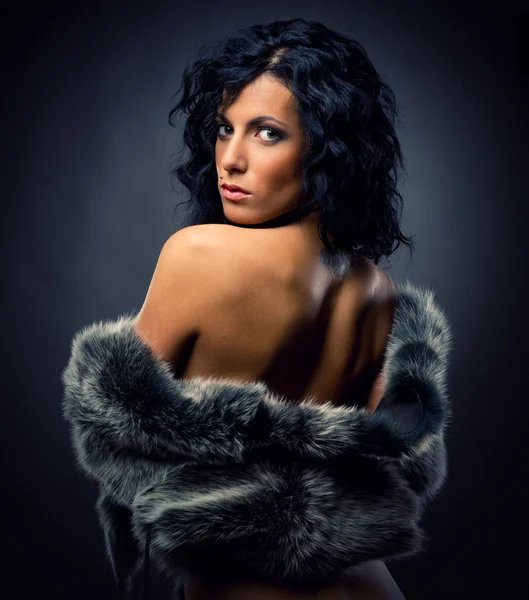 Beautiful sexy woman in fur coat — Stock Photo, Image