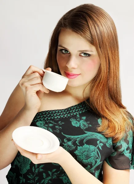 Lady holds cup — Stock Photo, Image