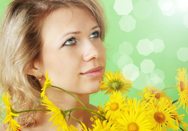 Woman with a flowers — Stock Photo, Image