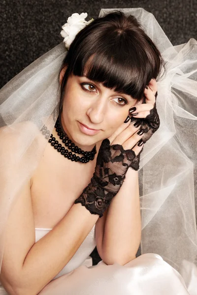 Bride in the black gloves — Stock Photo, Image