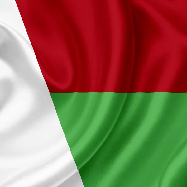 Madagaskar macha flagą — Zdjęcie stockowe