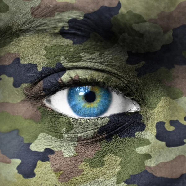 Army camouflage colors on human face — Stock Photo, Image