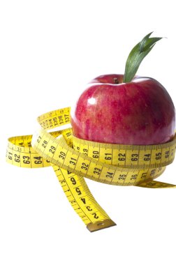 Apple and a measure tape - diet concept clipart