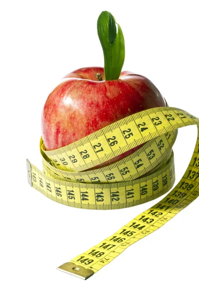 Measure tape and fresh apple — Stock Photo, Image