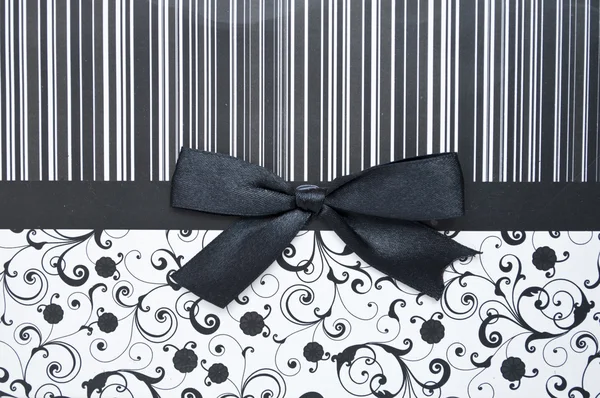 Black gift bow on black seamless pattern — Stock Photo, Image