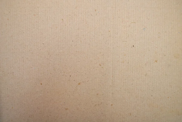 Kahverengi kağıt kartı tahta arka plan — Stok fotoğraf