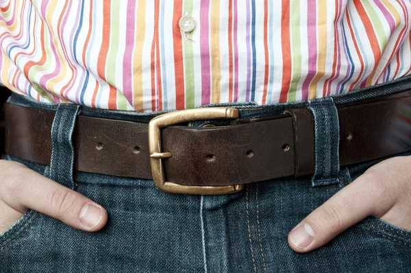 Jeans leather belt and shirt with hands in pocket — Stock Photo, Image