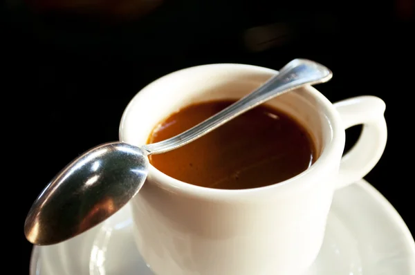Coffee on black background close-up shot — Stock Photo, Image