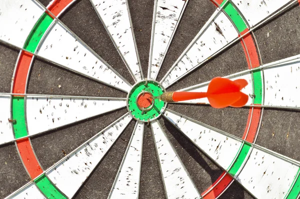 Red dart struck in center — Stock Photo, Image