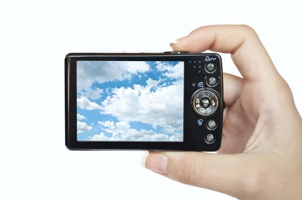 Beyaz arka plan gökyüzü fotoğrafta izole elinde fotoğraf makinesi — Stok fotoğraf