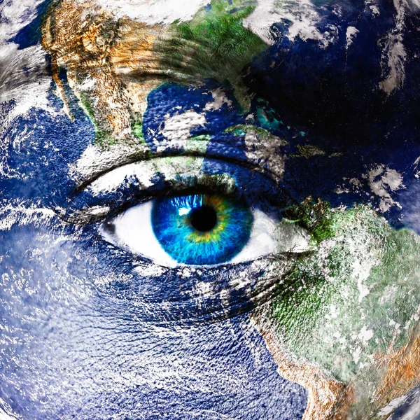 地球と人間の目 ストック画像