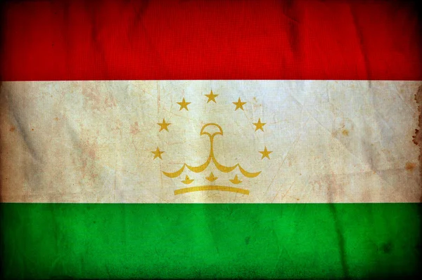 Tadzjikistan grunge flagga — Stockfoto