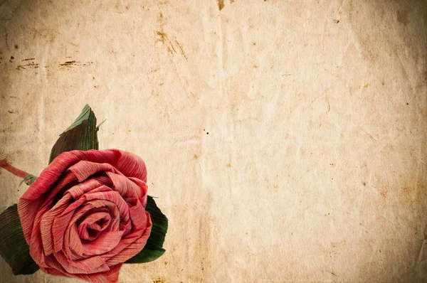 Vinobraní papír s červenou růží — Stock fotografie