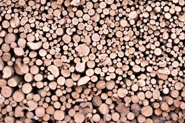 Stacked wood logs background clipart