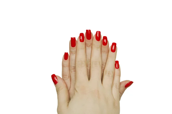 Manos de mujer manicura roja aisladas en blanco — Foto de Stock
