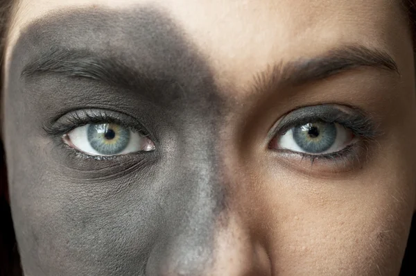 Blue eyes with black makeup — Stok fotoğraf
