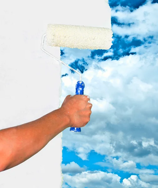 Hand painting sky on white wall — Stock Photo, Image