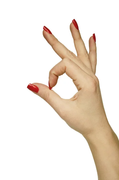 Женская рука показывает знак ОК — стоковое фото