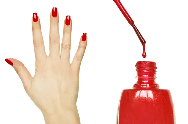 Conjunto de manicura - Hermosa mujer de color rojo manicura mano y clavo polis — Foto de Stock