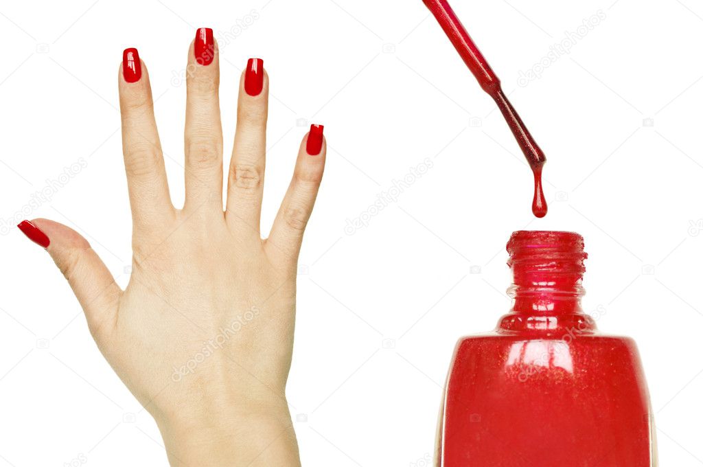 Manicure set - Beautiful red manicured woman hand and nail polis