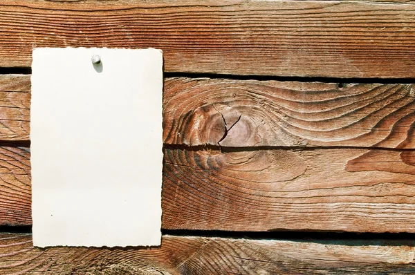 Blank paper note on wooden background — Stock Photo, Image