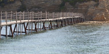 Small islet Agios Sostis connected with a bridge to Zakynthos is clipart