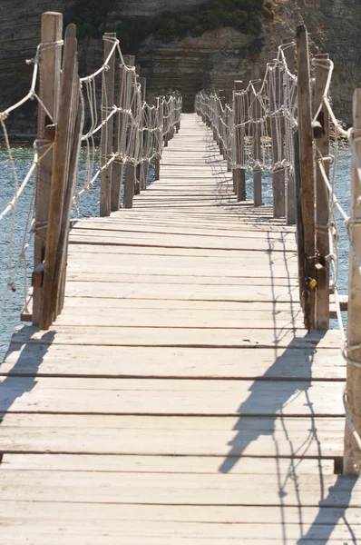 Abstrakt Visa på trä beach bridge — Stockfoto