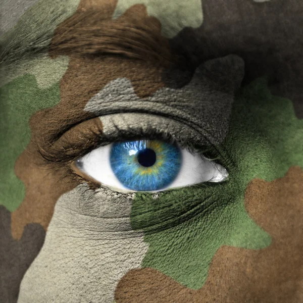 Army camouflage on human face — Stock Photo, Image